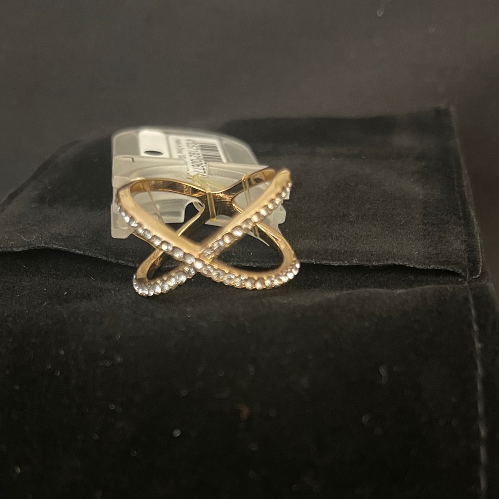 Elegant Gold and Silver Crossover Ring